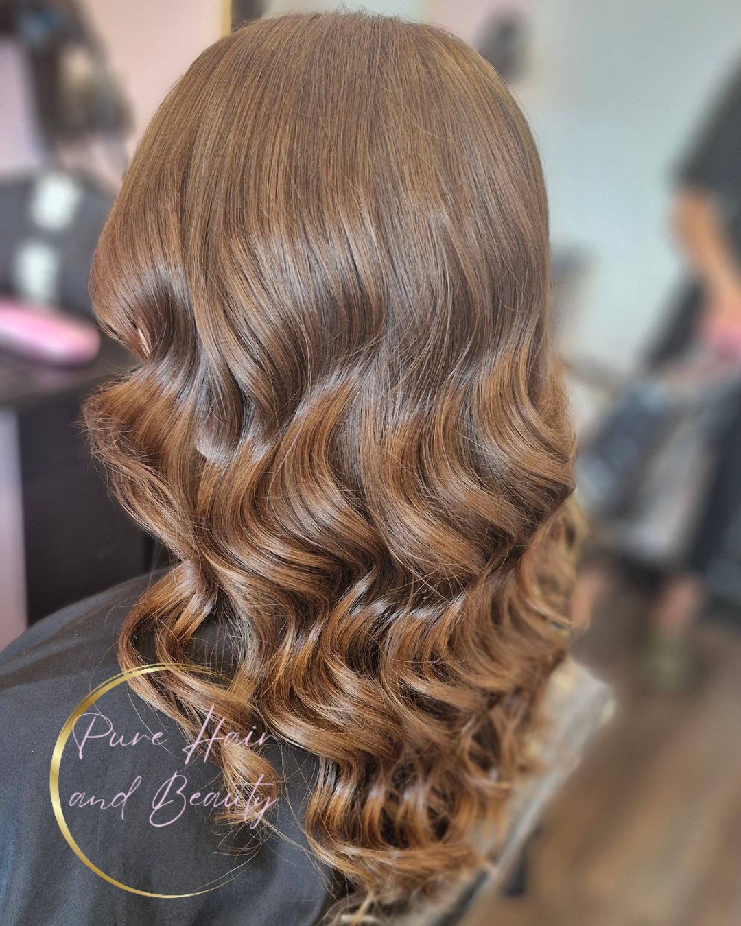 Glossy brunette hair styling by Pure Hair & Beauty