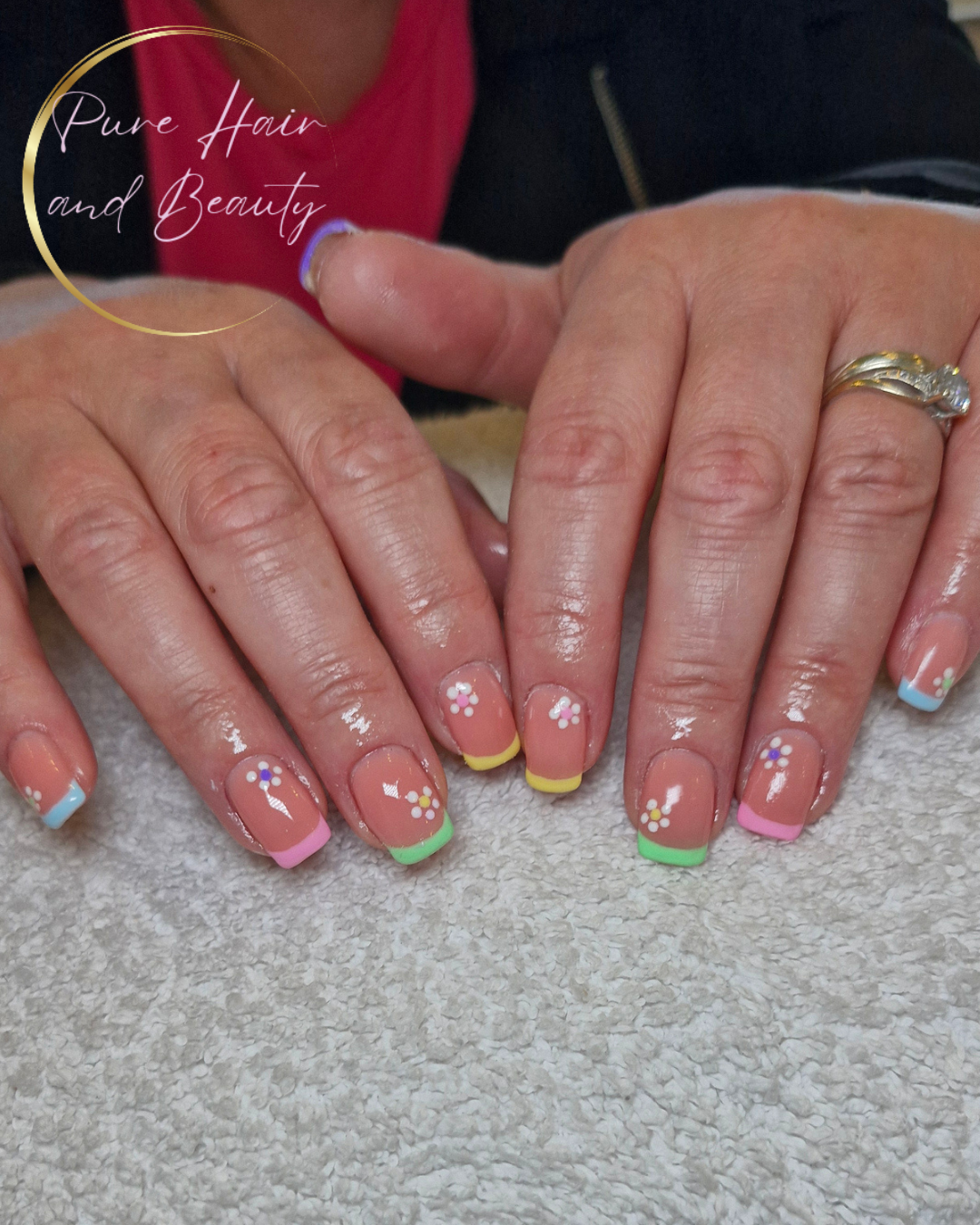 Pastel floral nail design created at Pure Hair & Beauty